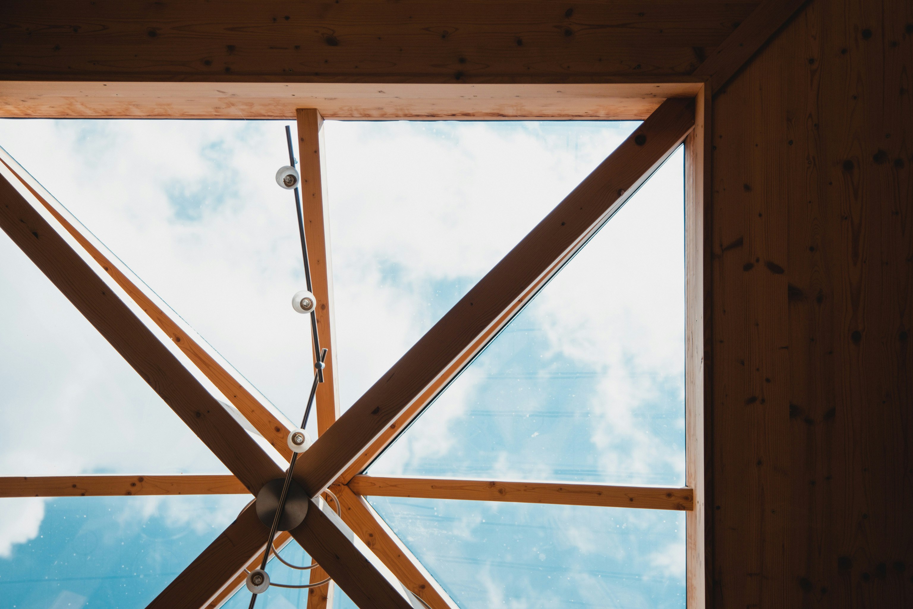 brown wooden framed glass window